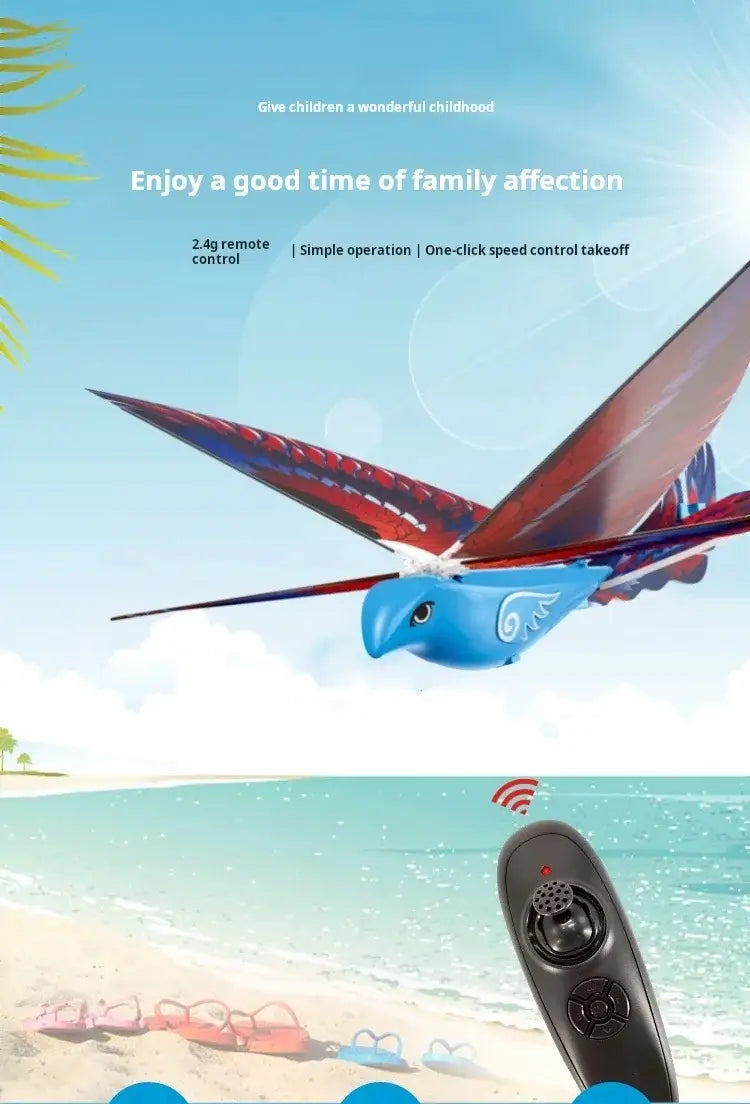 Remote control flying bird toy in blue and red with detailed wing patterns flying above a beach scene for outdoor remote control use.
