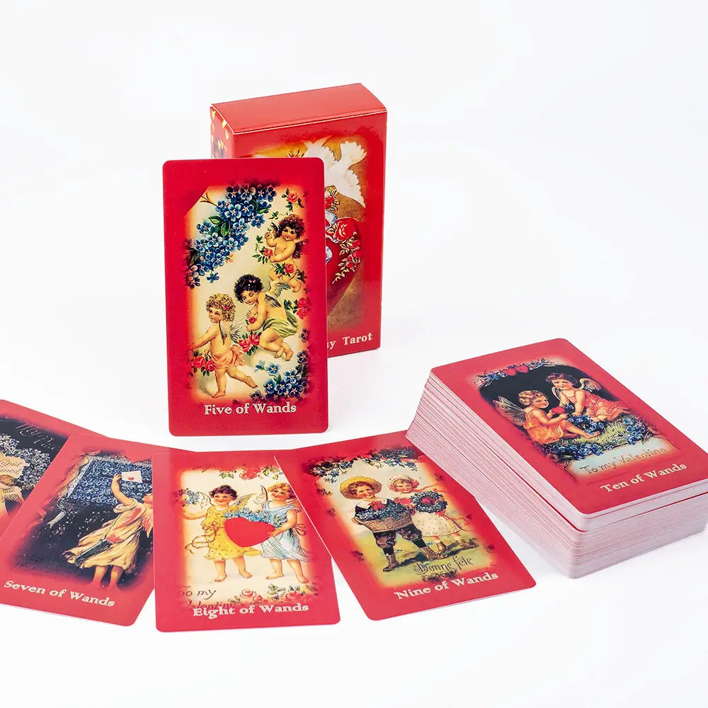 red Valentine tarot deck love oracle cards featuring vintage-style cherub and floral illustrations on red playing cards with card backs displaying to my valentine in a classic font