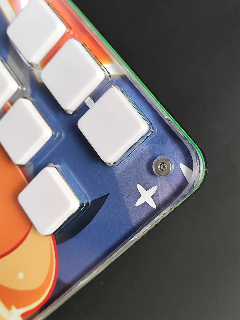 A vibrant blue and orange themed djmax mechanical gaming keyboard with white square keycaps features left joystick support and a data cable for joystick moves.