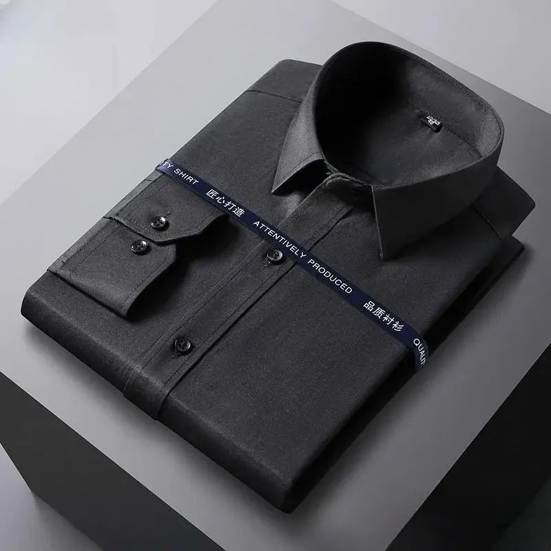 black men long sleeve dress shirt with a crisp collar and buttoned cuffs neatly folded on display featuring anti wrinkle formal office white fabric.