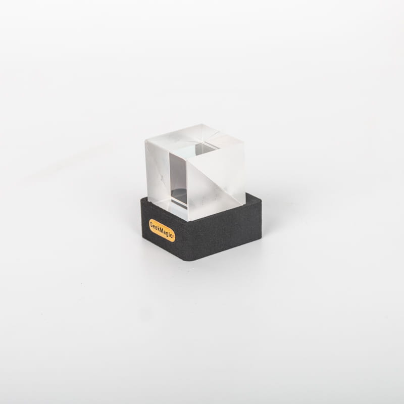 Clear acrylic cube-shaped prism smart weather station crystal gif clock mounted on a black base with Geekmagic branding.