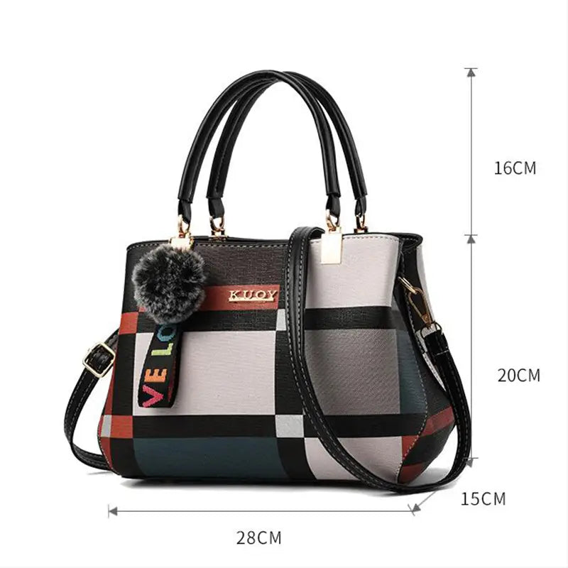 A stylish black white red and gray plaid black crossbody handbag in pu leather with a fluffy pom-pom charm featuring style1 style2 design.