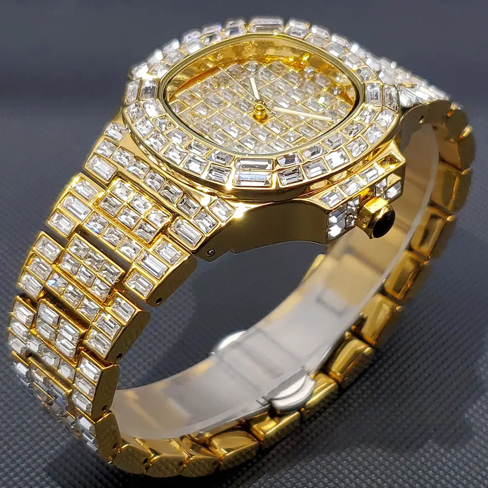 Gold-tone iced out diamond quartz watch for men with a silver stainless steel bezel and bracelet encrusted in baguette-cut clear crystals.