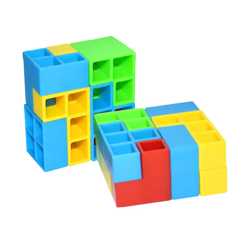 Colorful plastic building block bricks in blue green yellow and red from the building block balance tetra tower game set.