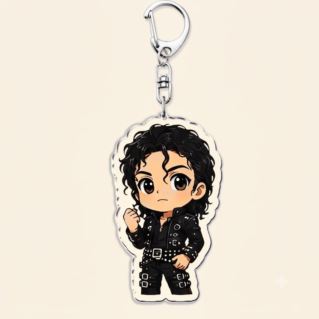 chibi-style acrylic keychain featuring a cartoon depiction of michael jackson in his iconic black leather outfit with silver buckles and curly hair.