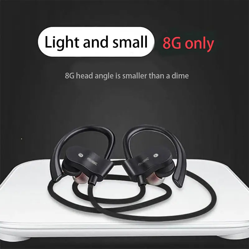 Black wireless sport earhooks Bluetooth headphones with a sleek curved design and flexible headband for a secure fit during exercise.