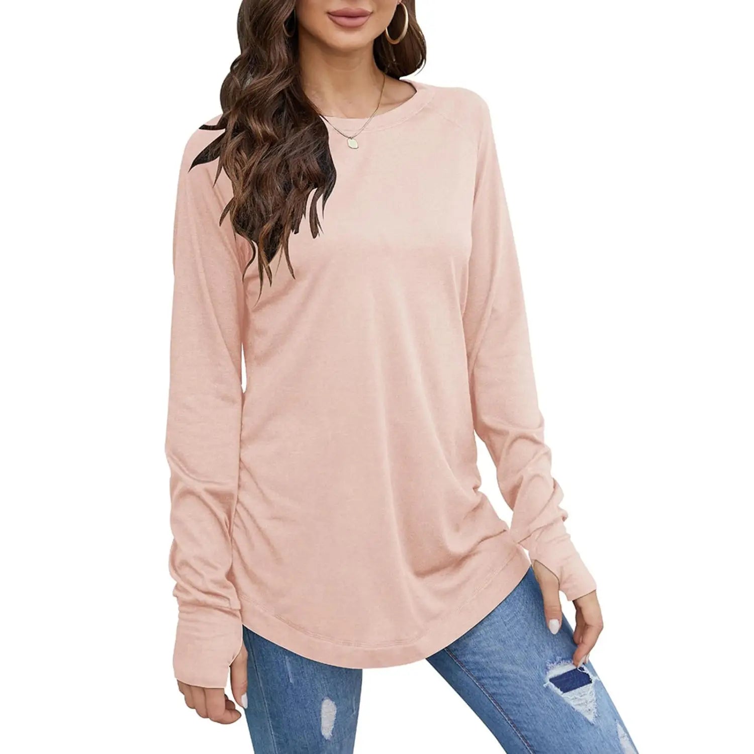 Women long sleeve cotton tunic top in soft blush pink with relaxed fit and subtle ruching at the cuffs.