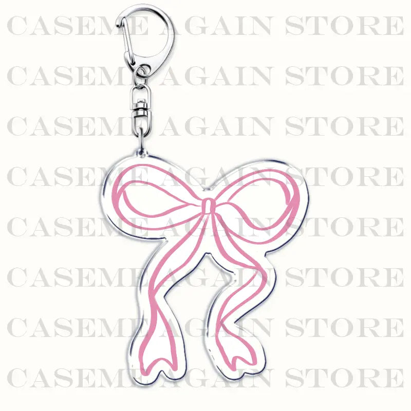 A pink and silver acrylic bow-shaped keychain with a metallic clasp designed as a Gracie Abrams anime fan gift.
