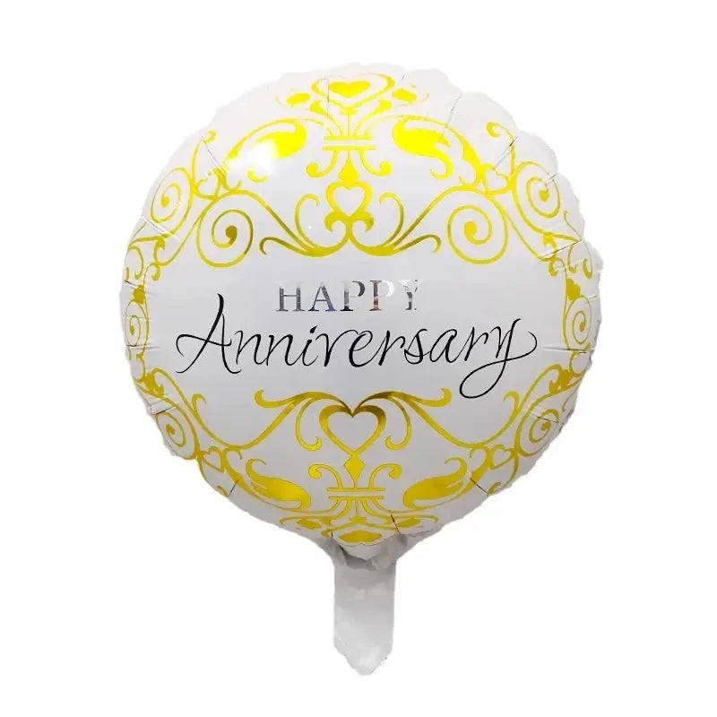 A white and gold foil balloon from a happy anniversary foil balloons 10 pack featuring intricate yellow damask patterns and happy anniversary printed in black cursive script.