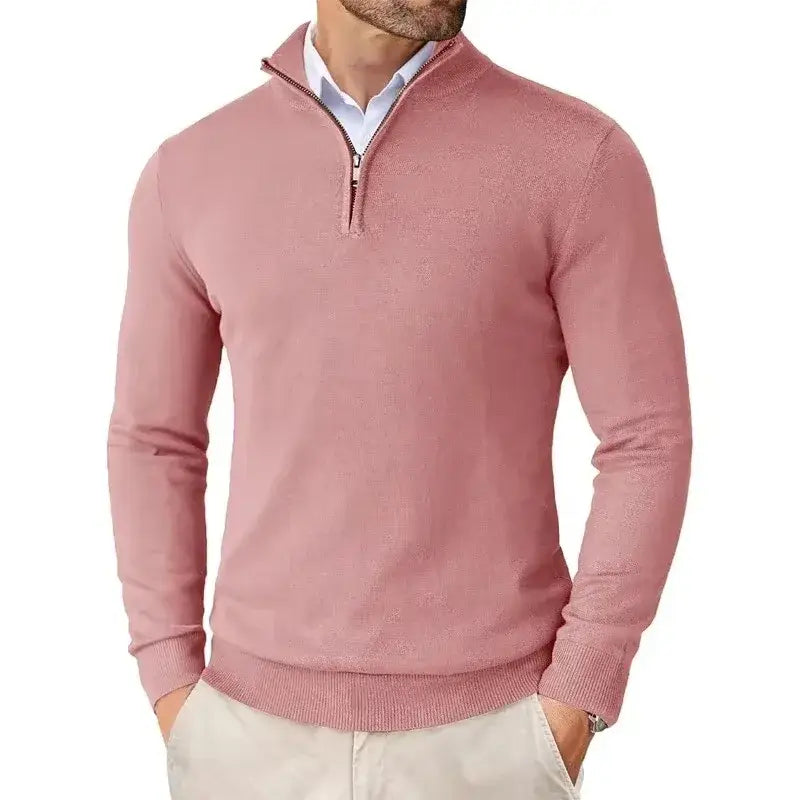 Pull-over homme à col zippé au quart, coupe slim, en rose tendre, à manches longues, avec col et poignets côtelés.