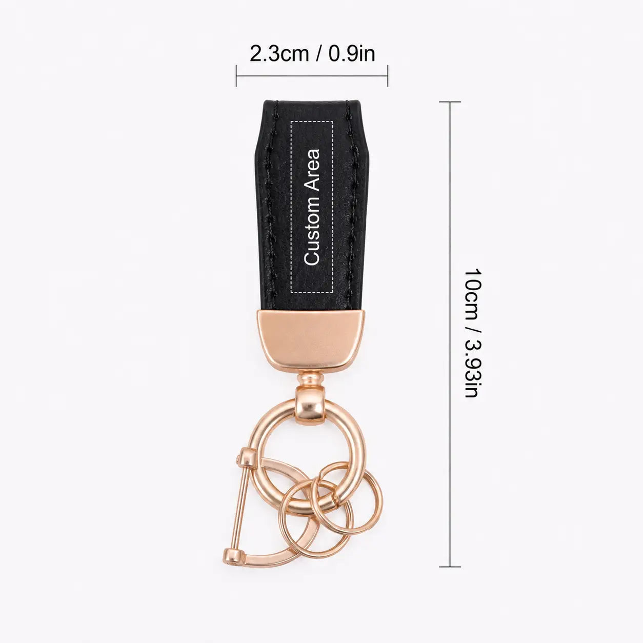 Personalized leather keychain in black with rose gold metal rings and a custom engraving area for a custom engraved key holder.