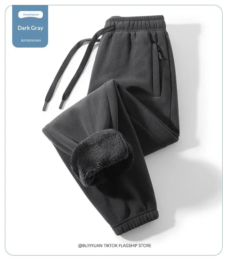 Pantalons de survêtement d’hiver décontractés pour hommes doublés en polaire en gris foncé, avec doublure en polaire moelleuse et une ceinture à cordon de serrage pour plus de confort et de chaleur.