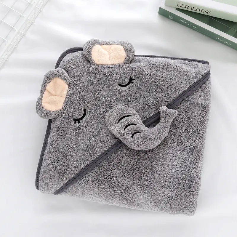 Grauer Baby-Bademantel und Handtuch mit Elefant-Motiv und Kapuze, mit weicher, flauschiger Textur und bestickten Gesichtszügen.