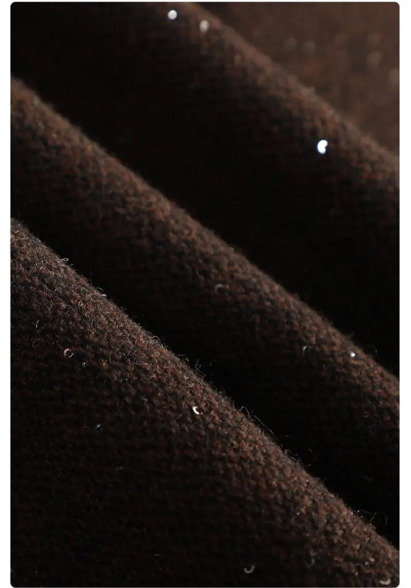 dark brown wool blend double breasted blazer fabric showcasing textured woolen material with subtle sheen and fine fibers visible