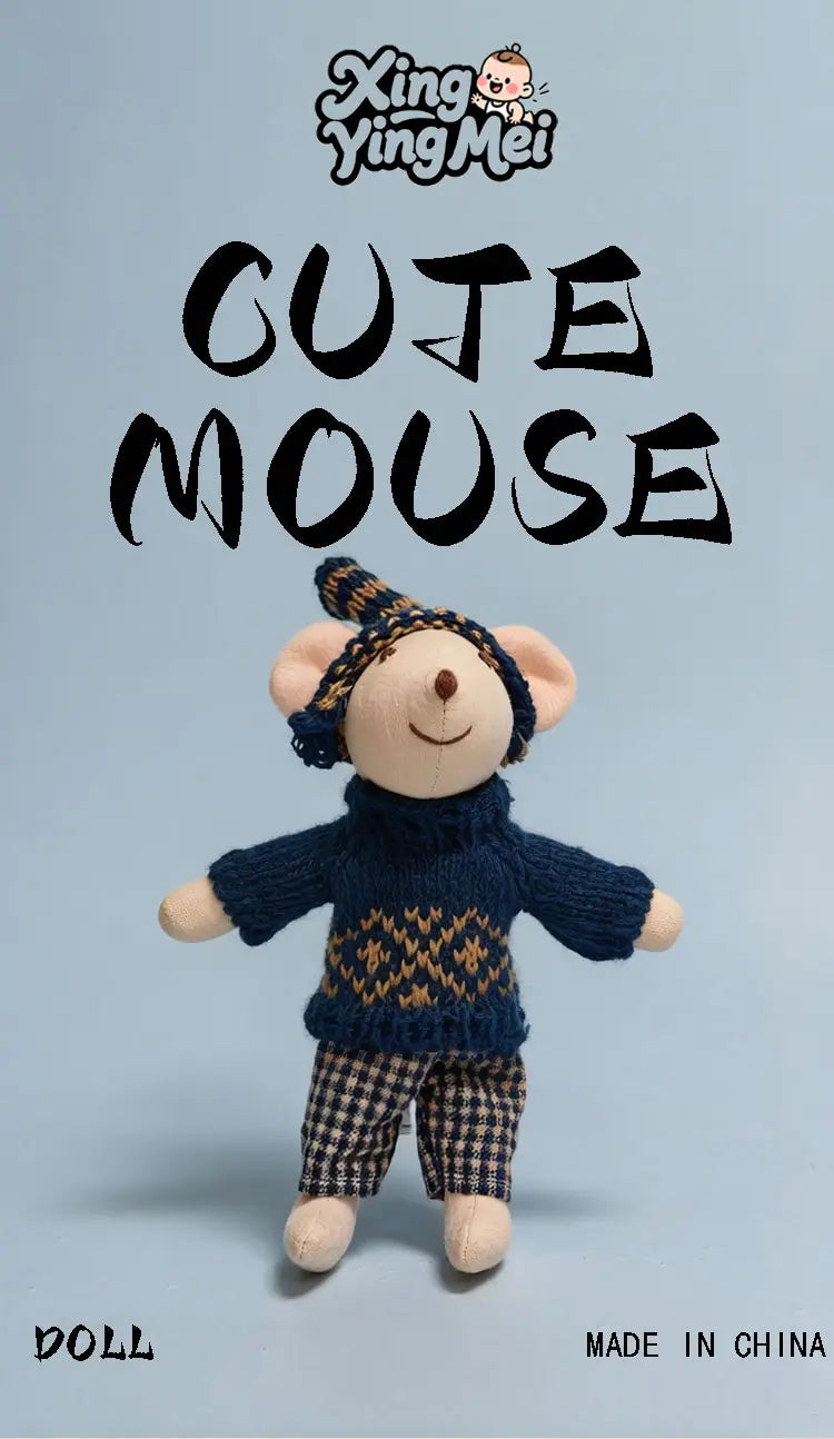 A plush mouse doll stuffed animal toy wearing a navy blue knitted sweater with a gold geometric pattern.