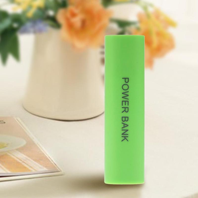 A vibrant lime green cylindrical power bank with power bank printed vertically in black text designed as a portable 18650 power bank case diy shell charger.