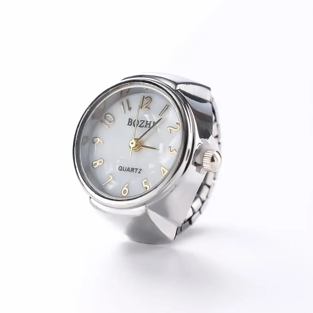 Silver-toned bozhi brand ring watch with a pearl-like white face, gold-tone numerals and hands, and a flexible metal band designed as unisex finger jewelry gift.