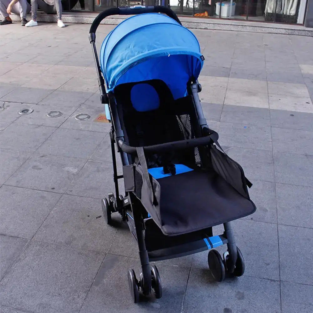 blue canopy universal stroller extension footrest with black frame and wheels designed for infant comfort and support