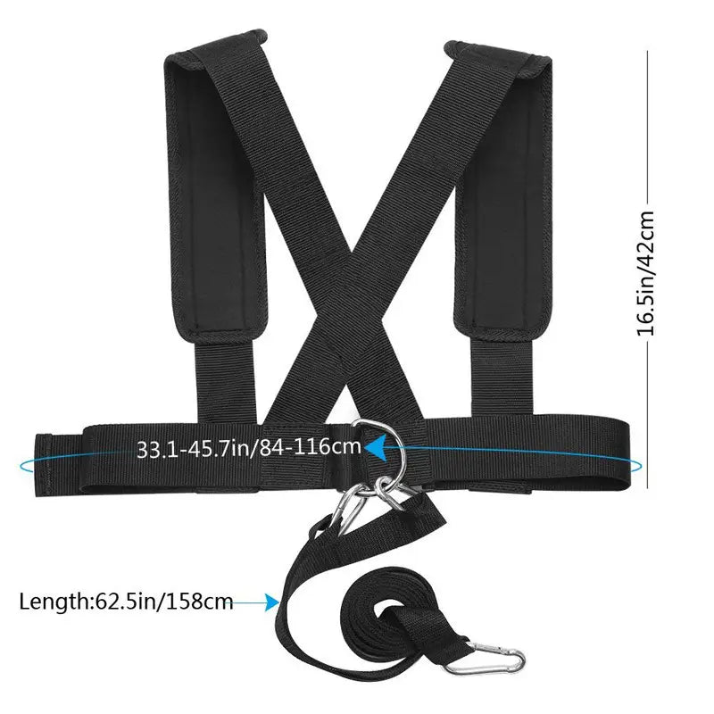 Black nylon agility training resistance harness sled pull strap with adjustable shoulder and chest straps featuring metal carabiners for secure attachment.