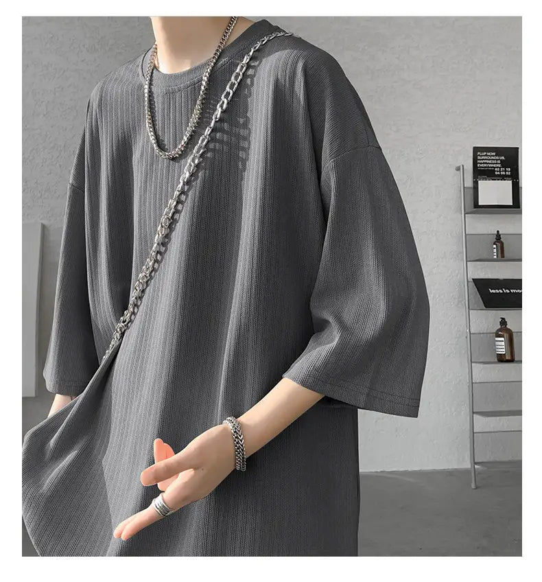 Gray ribbed knit oversized men striped summer t-shirt with three-quarter sleeves.