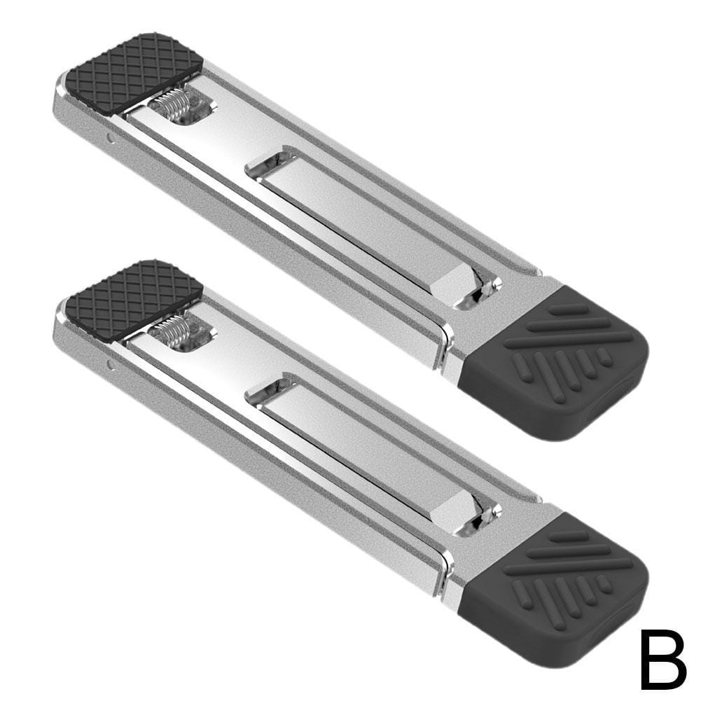 Arrêts de porte en métal argenté avec extrémités en caoutchouc noir, illustrés comme faisant partie d’un support portable pliant pour ordinateur portable en aluminium.