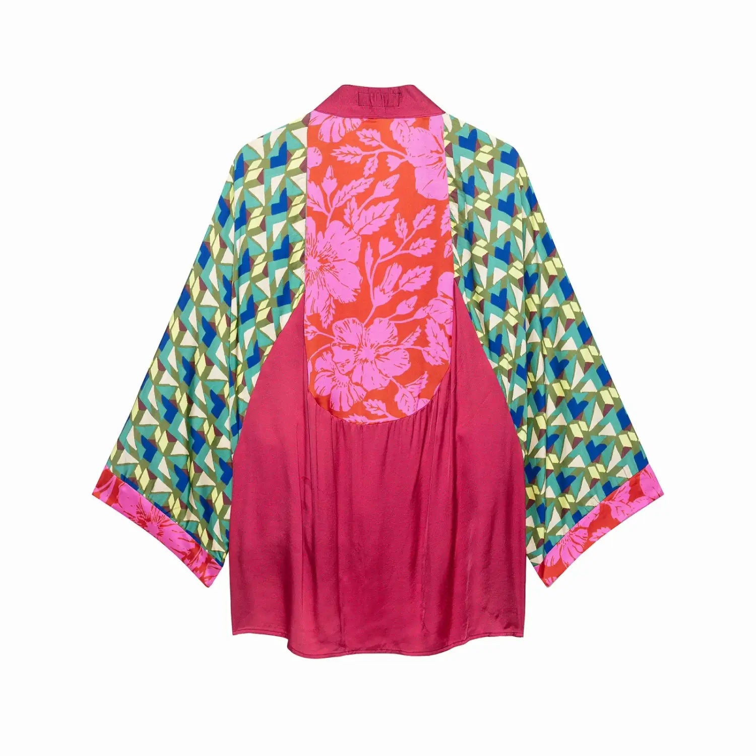 Vibrant pink satin kimono with a bold orange floral panel and geometric patterned sleeves in teal blue green and yellow featured in a floral print two piece midi skirt set.