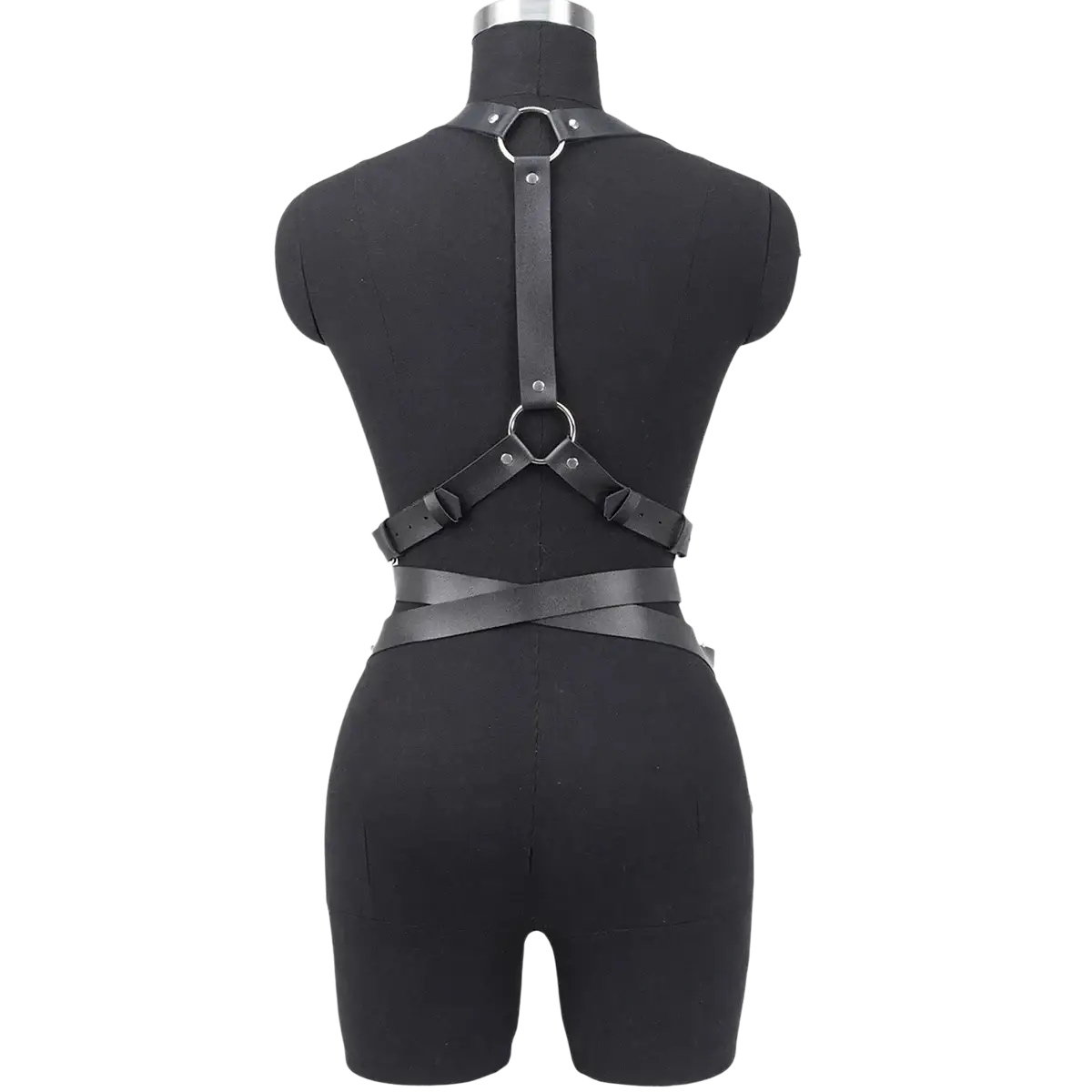 Correa de arnés de pecho de cuero negro estilo punk gótico con anillos metálicos y correas ajustables, mostrada desde el frente.