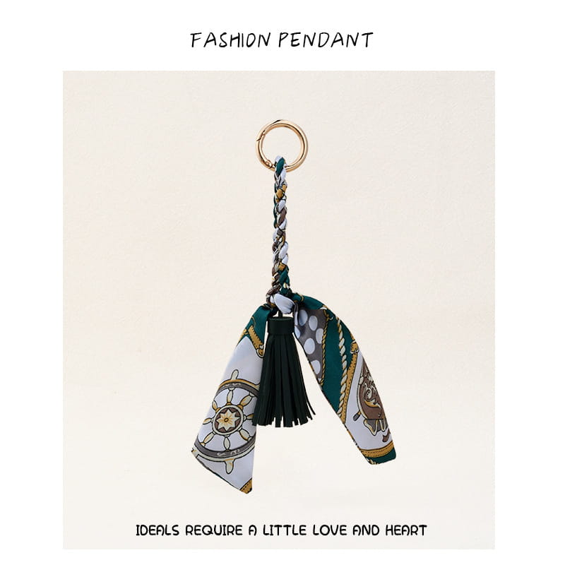 Porte-clés à gland de foulard en soie à motif vert et blanc, élégant, pour sacs, avec un gland noir.