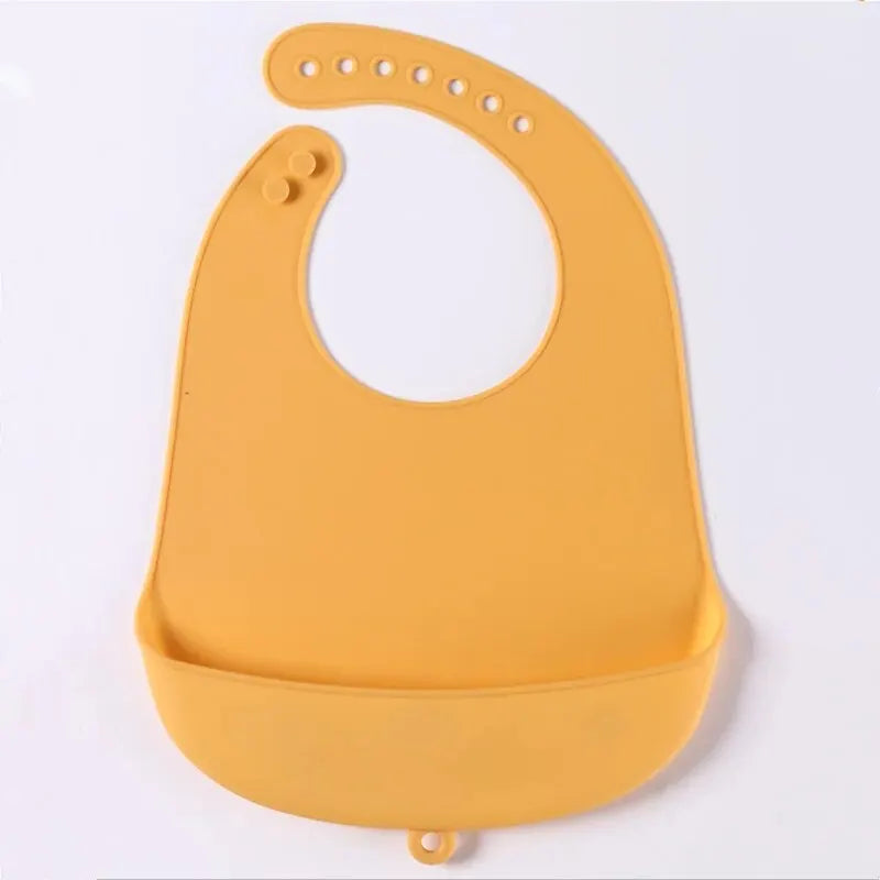 The baby feeding bib is made of silicone and has a water-resistant design. It is suitable for feeding purposes.