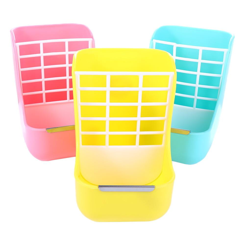 brightly colored plastic rabbit hay feeders in pink yellow and blue with white grid patterns designed for small animals with a food bowl.