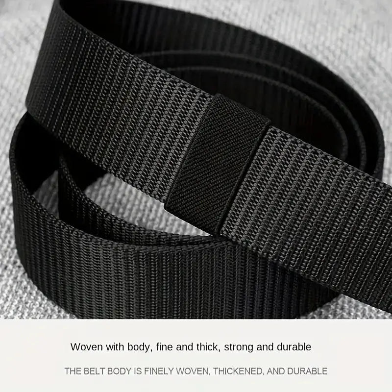 Black woven men canvas tactical belt with thick durable fabric and reinforced automatic metal buckle section.
