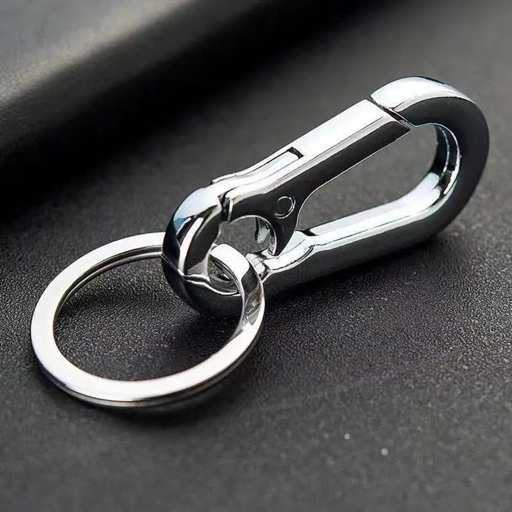 Shiny chrome zinc alloy car keychain with a sturdy carabiner clip and circular ring for anti-lost use.