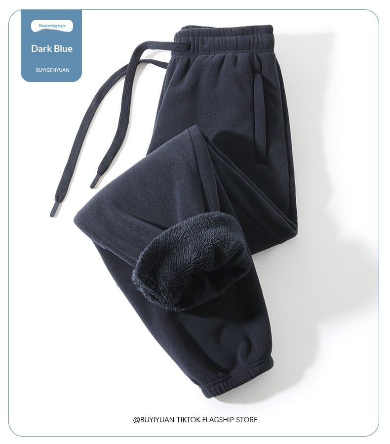 Pantalons de survêtement d’hiver décontractés pour hommes doublés en polaire en bleu foncé, avec doublure en polaire, taille élastique et cordon de serrage pour plus de confort.