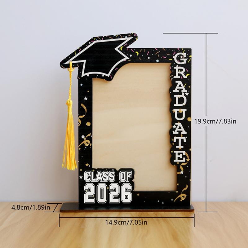 Class of 2026 wooden graduation photo frame in black with gold tassel and decorative stars and confetti accents for commemorating graduation.