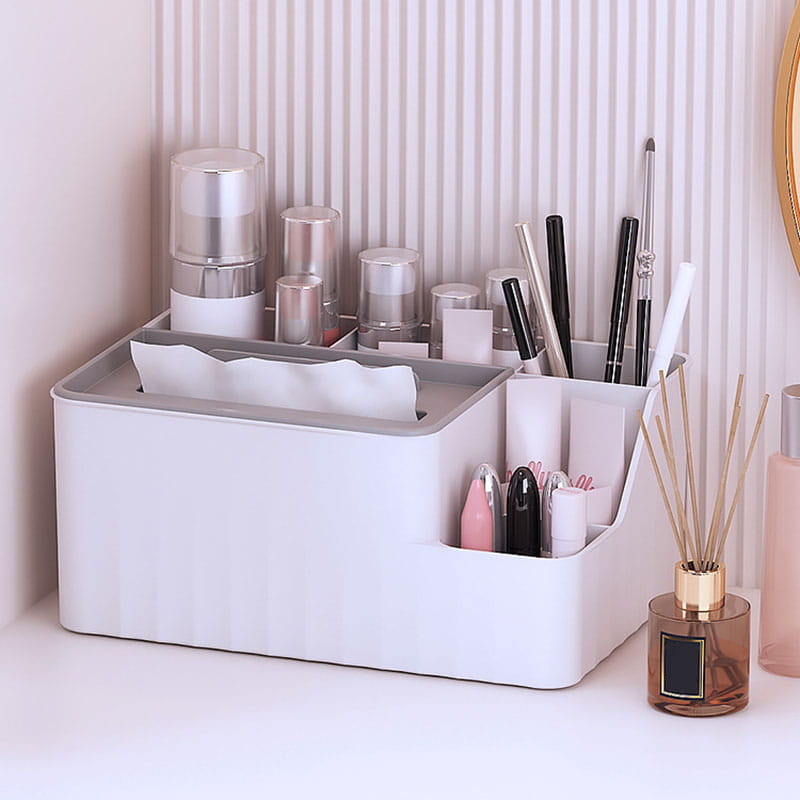 White plastic multi compartment makeup organizer with gray interior lining and sleek modern design for desk organization.