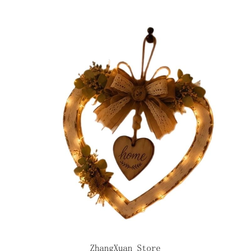 Couronne en bois en forme de cœur à tons chauds, avec un nœud en dentelle, des accents de verdure séchée et un pendentif de maison gravé, utilisée comme plaque murale rustique pour cœur à DEL pour la décoration intérieure.