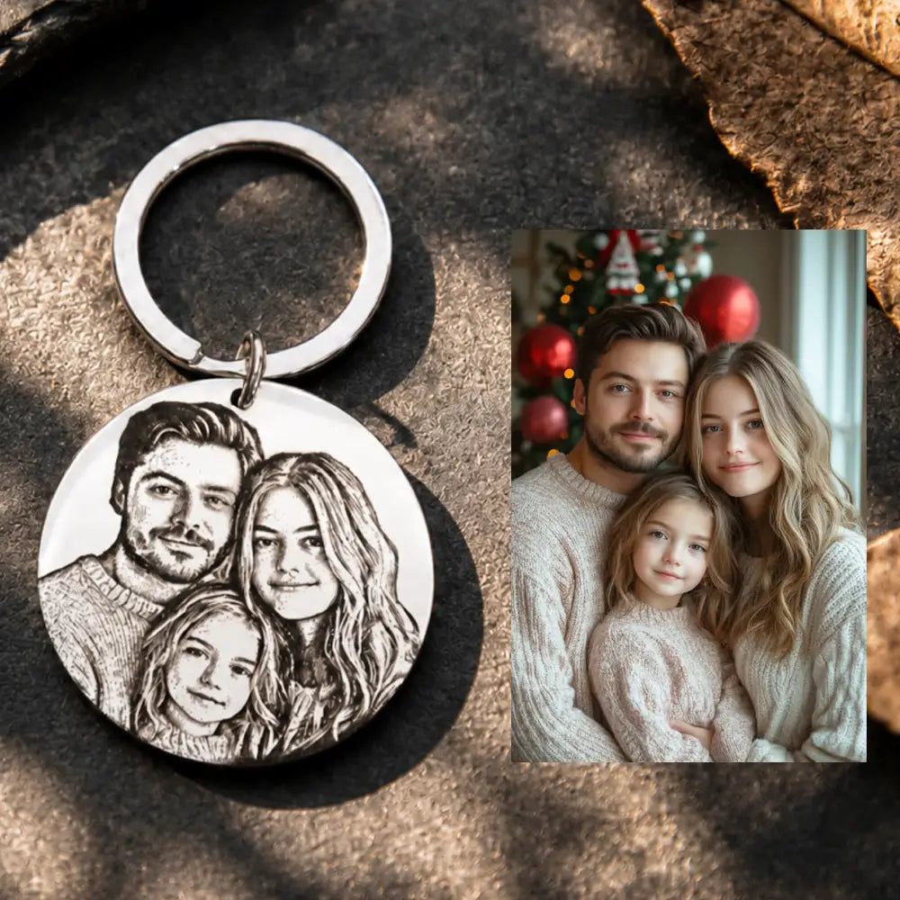Silver circular stainless steel keychain featuring a finely engraved black and white portrait of a family of three custom photo keychain round pendant.