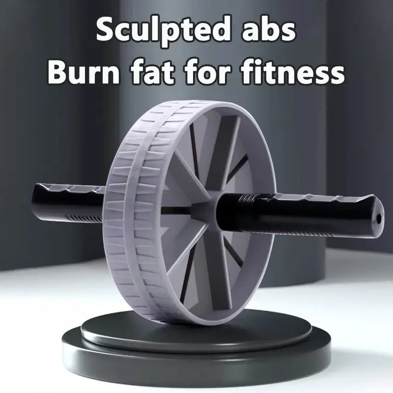 Roue d’exercice abdominale silencieuse « ab roller » gris et noire, dotée de poignées de préhension texturées et d’une roue cannelée pour le fitness.