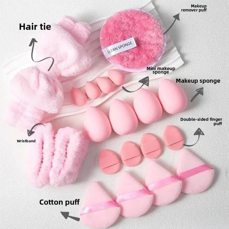 pink fluffy hair tie with soft plush texture and fuzzy edges included in a makeup brush and sponge set 46 piece pink for makeup application and eye makeup application