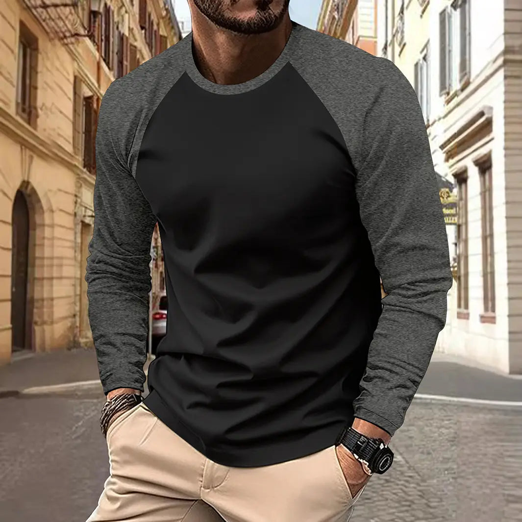 Tee-shirt à manches raglan longues noir et gris chiné, fabriqué dans un tissu confortable, pour une tenue de printemps décontractée pour homme.