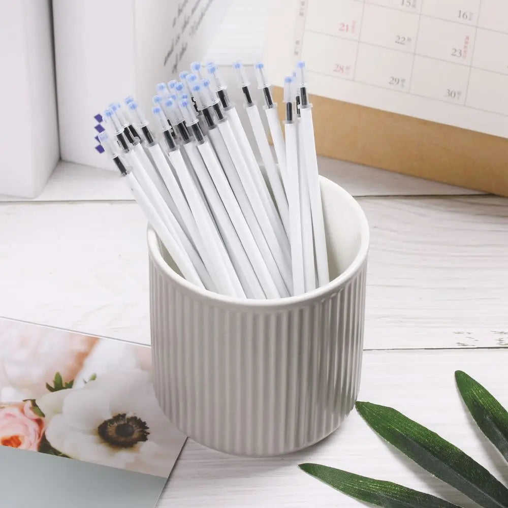 10PCS/Lot School Writing Supplies Office Black Ink White Color Shell Gel Pen Refills Medium Nib Core