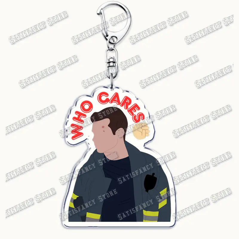 Clear acrylic keychain featuring a stylized firefighter illustration in dark uniform with yellow reflective stripes and bold red who cares text for 9-1-1 tv show firefighter gift.