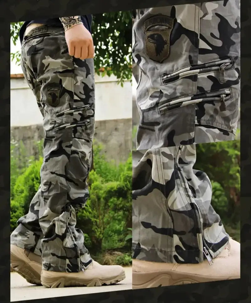 Herren-Tactical-Cargo-Hosen aus Baumwolle mit Camo-Jogger-Optik in Grau und Schwarz mit Tarnmuster, mehreren Reißverschluss-Taschen und einem Patch am Oberschenkel.