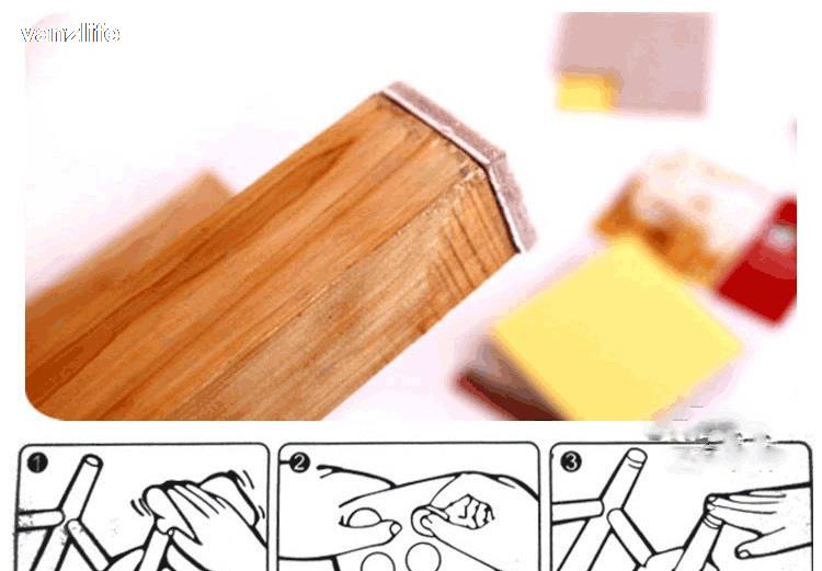 Filz-Möbelgleiter als 5 mm Fußbodenschutz, auf einem Holzblock mit hellbrauner Oberfläche und sichtbarer Maserung dargestellt; mit einer metallischen Kante entlang der Oberkante.