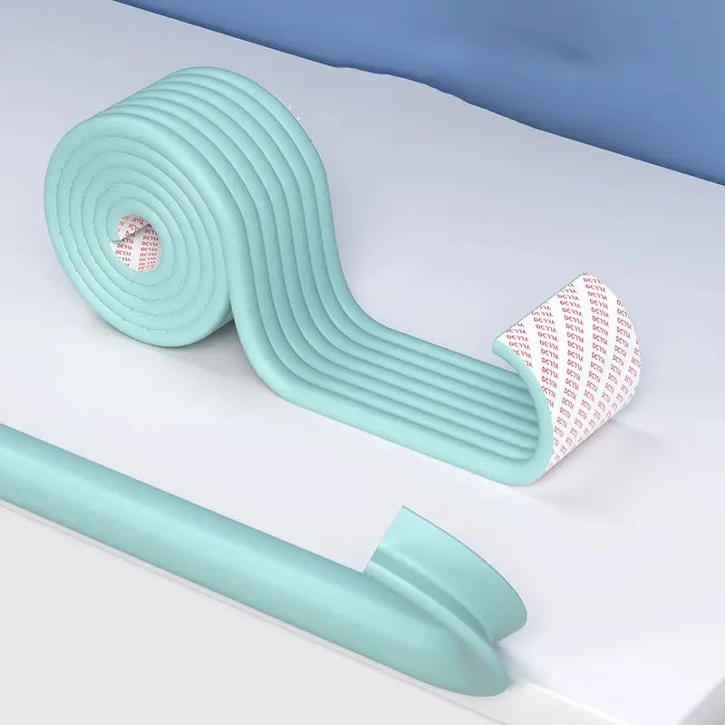 Light blue ribbed foam baby safety edge protector strip 2m with adhesive backing for cushioning sharp edges.