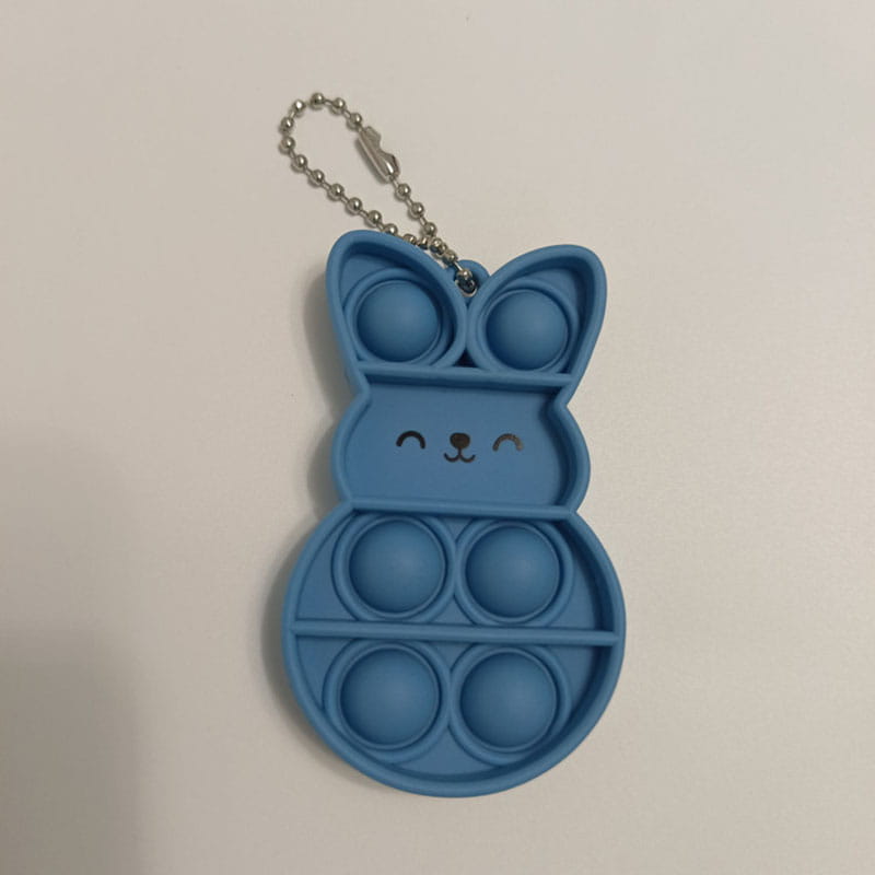 rabbit pop it fidget keychain featuring a blue bunny-shaped silicone pop-it toy with a silver chain keyring for portable stress relief.