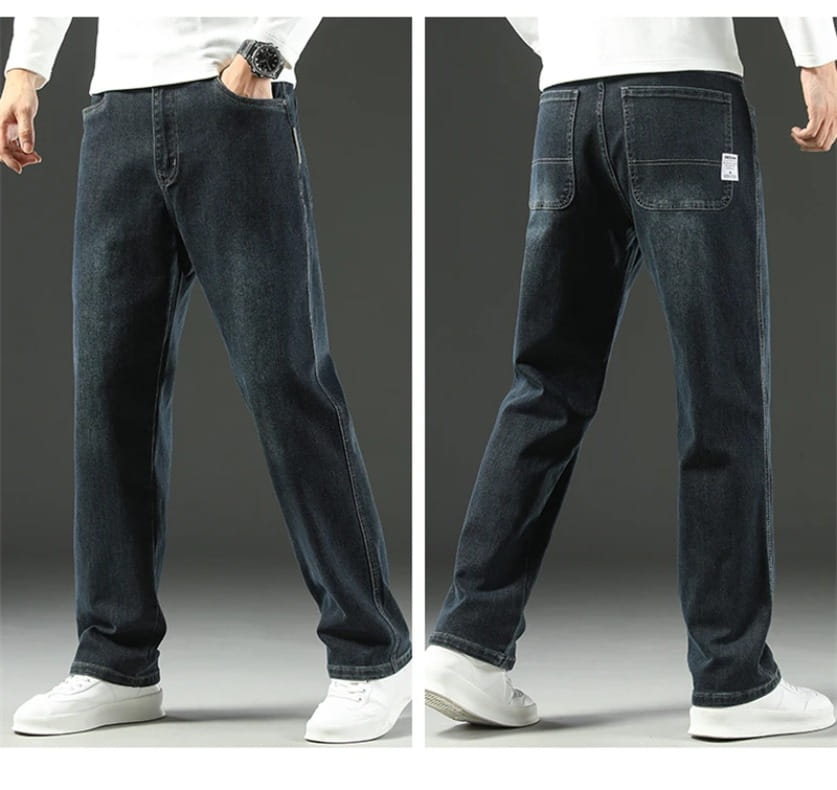 Men’s loose straight business casual jeans in dark indigo denim with a relaxed fit, subtle fading, classic stitching, and a small white label on the back pocket shown from the back side.