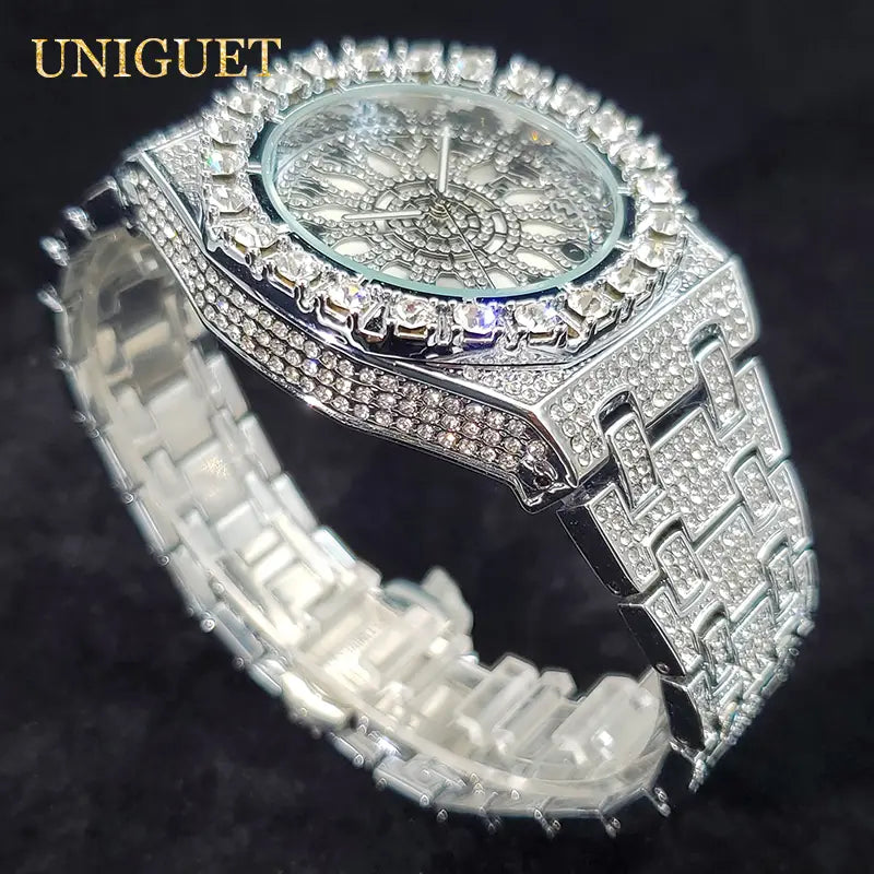 A dazzling silver-tone iced diamond men’s quartz watch featuring a square face with an intricate diamond-encrusted bezel and band designed as a luxury silver hip hop timepiece.