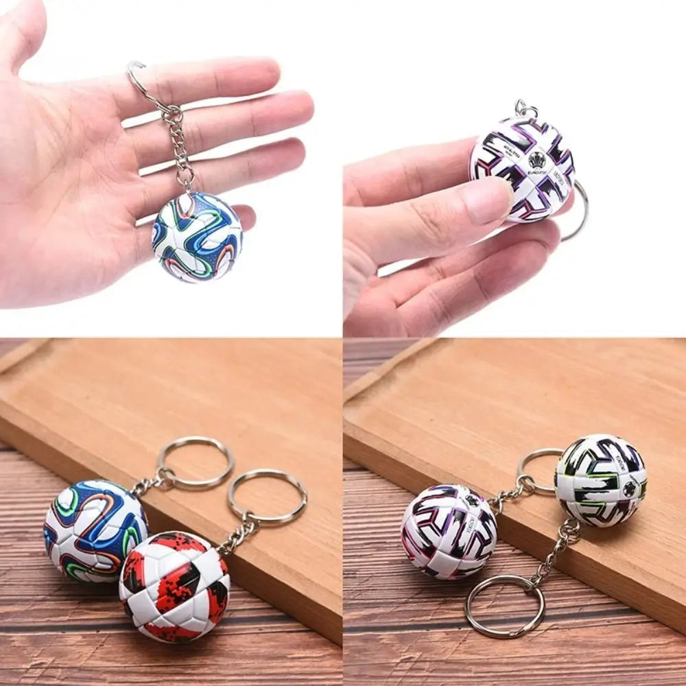 Leather football keychain sports souvenir pendant featuring miniature vibrant patterned soccer balls with metallic chains and rings.