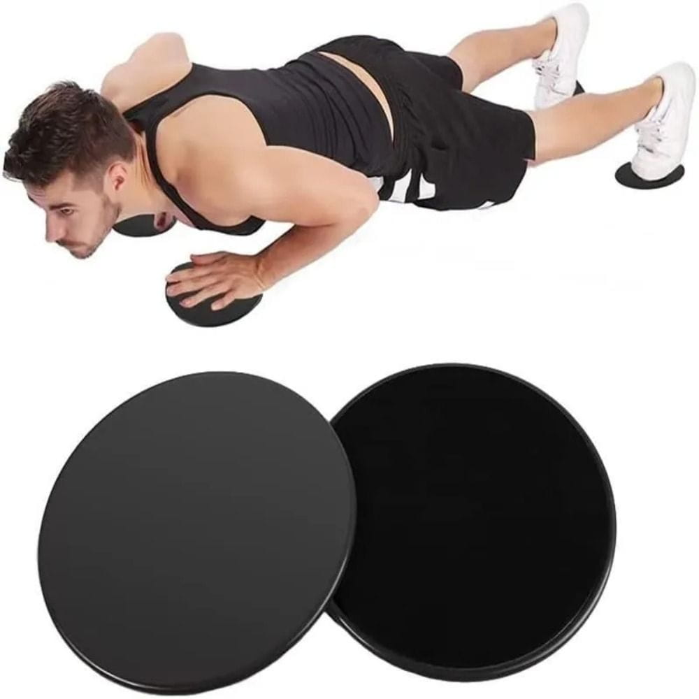 Black circular core sliders fitness gliding discs with a smooth matte finish designed for abdominal training.